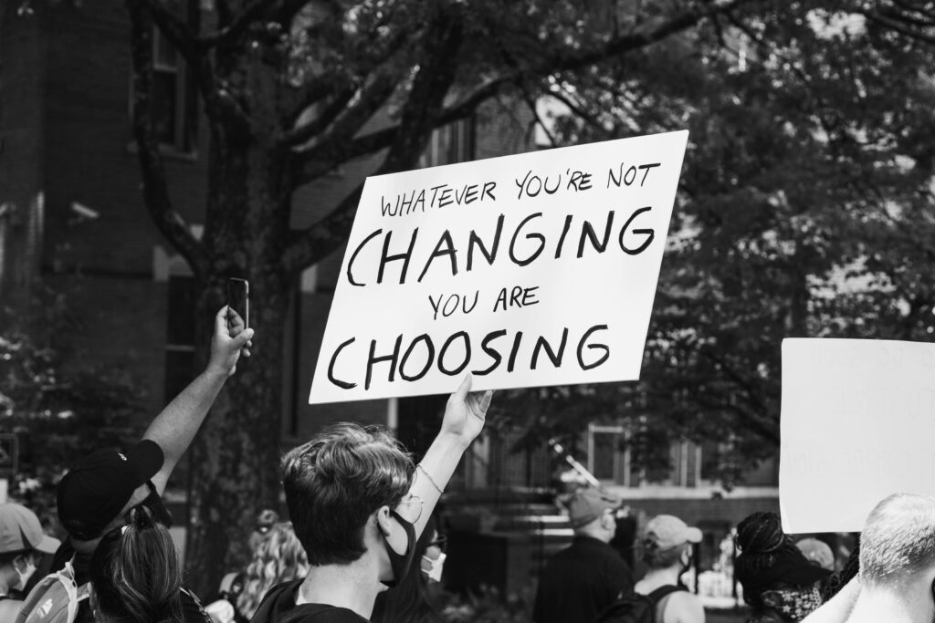 https://unsplash.com/photos/grayscale-photo-of-people-holding-a-signage-LB9dklK0xb0?utm_source=unsplash&utm_medium=referral&utm_content=creditShareLink