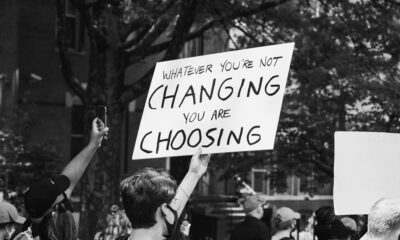 https://unsplash.com/photos/grayscale-photo-of-people-holding-a-signage-LB9dklK0xb0?utm_source=unsplash&utm_medium=referral&utm_content=creditShareLink